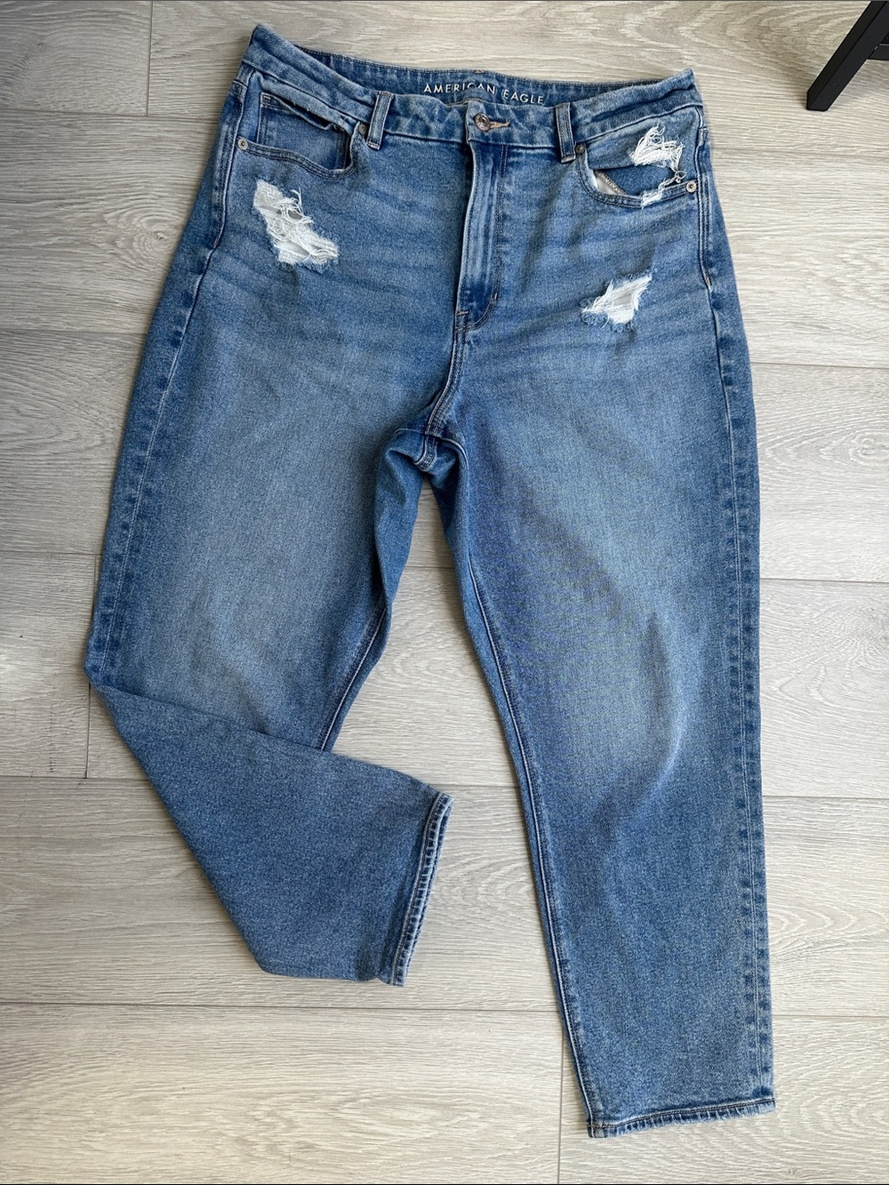 American Eagle Outfitters Curvy Mom Jeans in Faded Blue with Distressed Accents